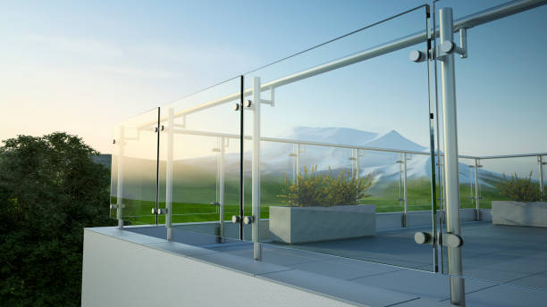 Modern stainless steel railing with glass panel and landscape view Balustrade - steel and glass, 3D illustration balustrade stock pictures, royalty-free photos & images
