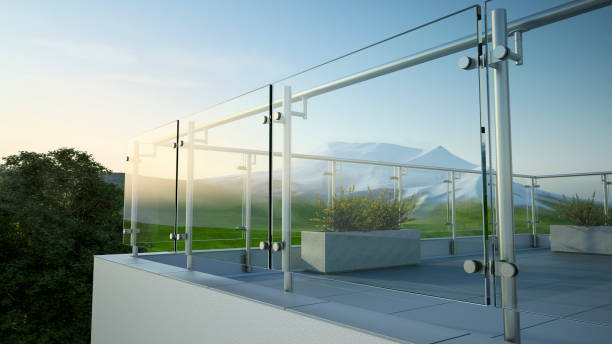 Modern stainless steel railing with glass panel and landscape view Balustrade - steel and glass, 3D illustration railings stock pictures, royalty-free photos & images