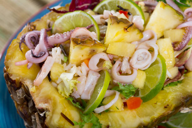 istock Salad with calamari, pineapple and lime 1219800656