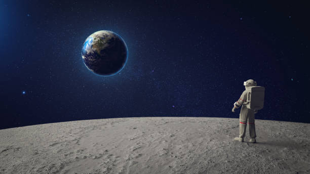 istock Astronaut watches Earth from Moon 1219802941