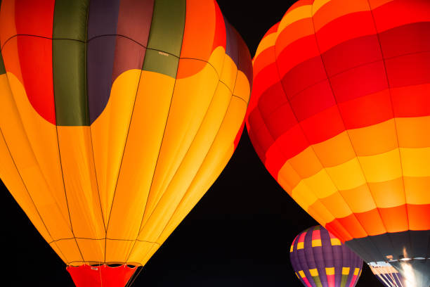 istock Colorful hot air balloons at night 1219803101