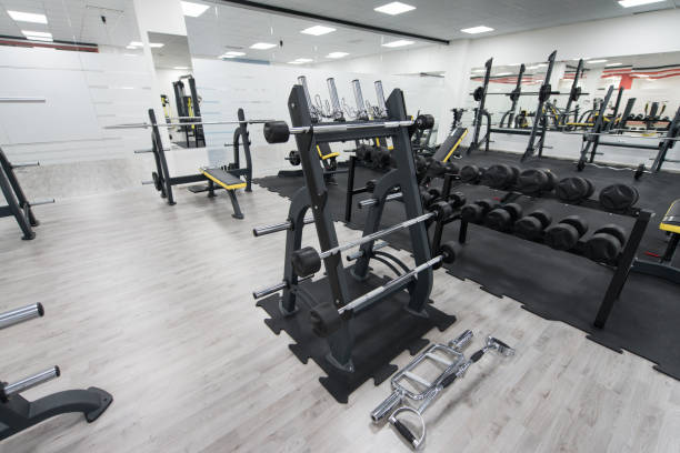 istock Interior Of New Modern Gym With Equipment 1219814540