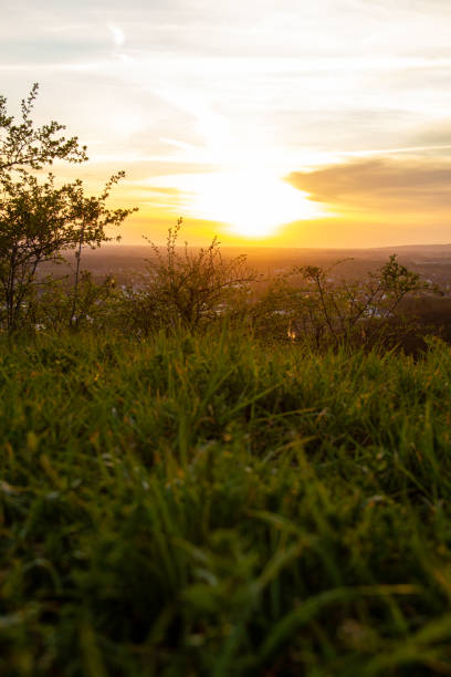 sunset in the nature over a town