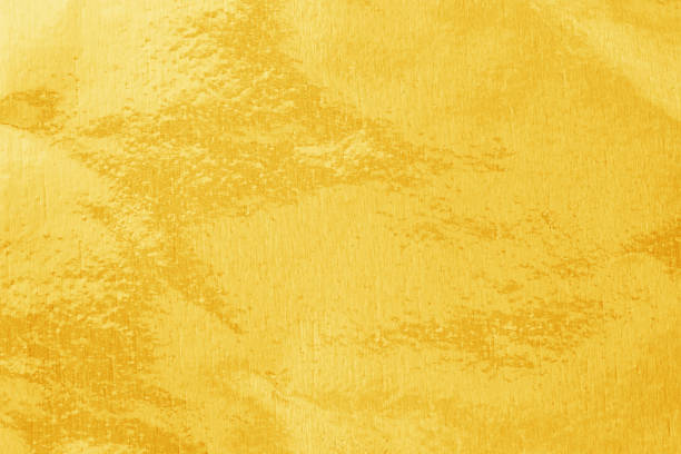 istock Shiny yellow gold foil texture for background and shadow. Gold  background 1219822204