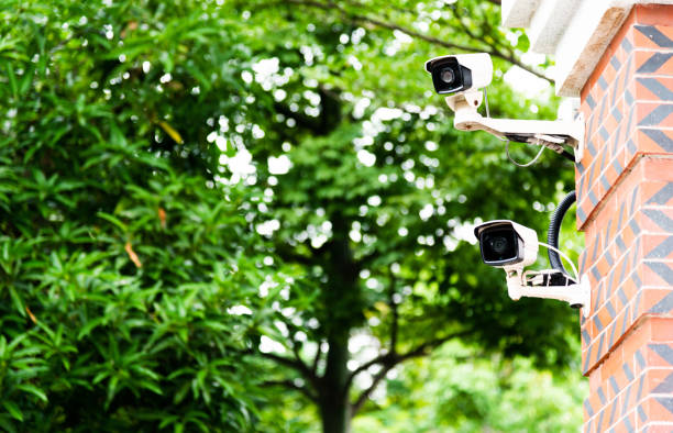 istock Security camera on the wall of residential building 1219824926