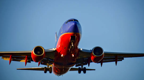 A Southwest Airlines B737 taking off An Southwest Airlines B737 taking off at Austin Bergstrom International Airport. austin airport stock pictures, royalty-free photos & images