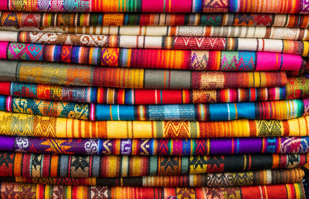 andean fabrics, poncho market, otavalo, ecuador - bedding merchandise market textile imagens e fotografias de stock