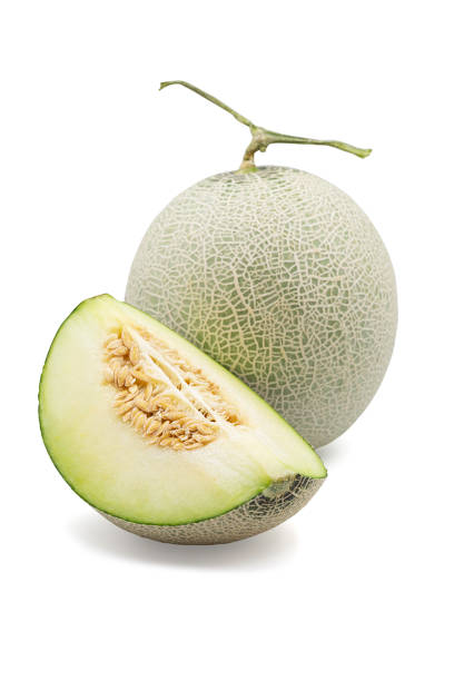 istock Organic japanese honeydew melon and a half on white isolated background with clipping path. Ripe green cantaloup melon have sweet taste and juicy for refreshing in summer. Fresh fruit concept. 1219834516