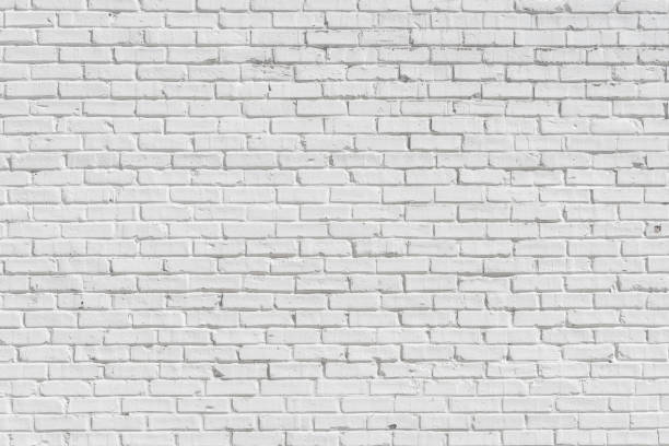 istock Old Brick painted white wall, can be used for texture or background 1219834519