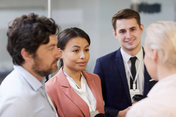 istock Business people talking at office 1219834752