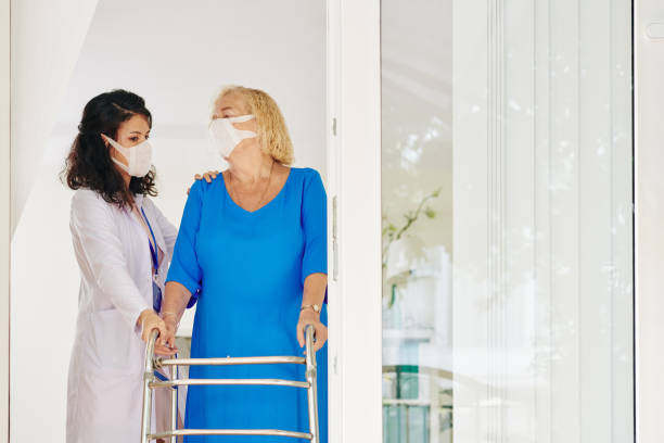 istock Medical walker and senior patient 1219836830
