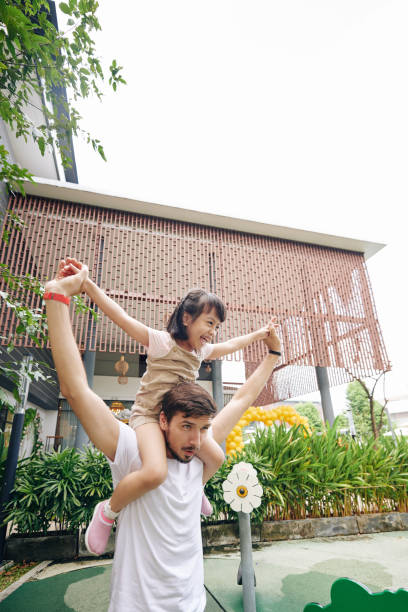 istock Father giving piggyback to daughter 1219837103