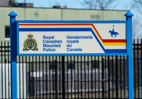 April 29, 2020 - Dartmouth, Canada - Street level signage for the Royal Canadian Mounted Police (RCMP) Headquarters located in Burnside Industrial Park.