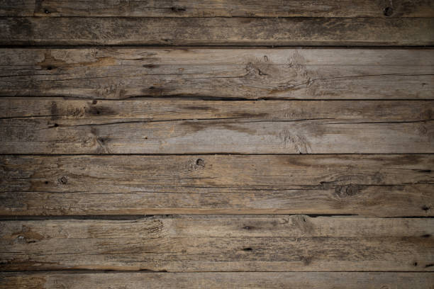 istock old dark striped wooden background 1219841174