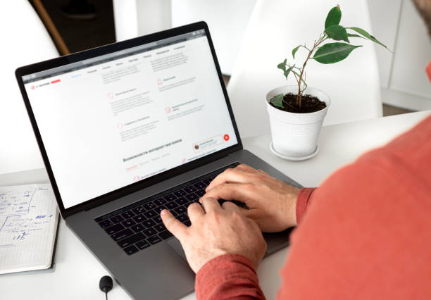 istock Man working on laptop in home office. Work at home office concept 1219842994