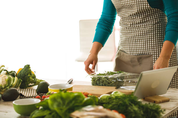 istock Preparation of a nutritive vegan snack with fresh leaves 1219845122