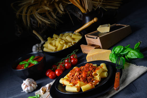 istock Rigatoni pasta with Bolognese sauce and fresh basil 1219848349