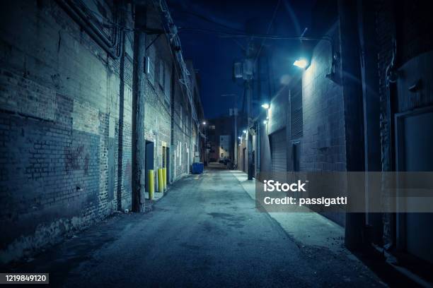 Dark And Eerie Urban City Alley At Night Stock Photo - Download Image Now - Alley, Dark, Street