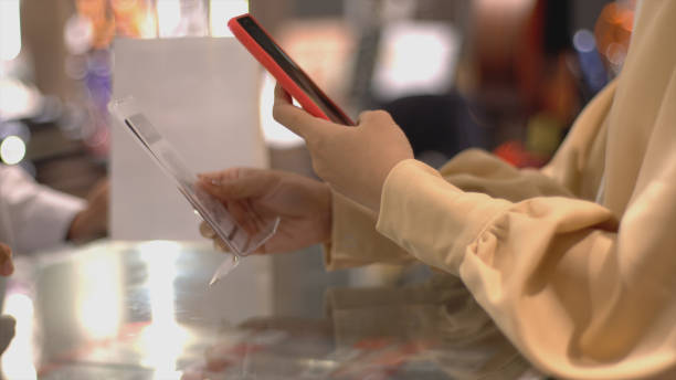 istock Asian Muslim Woman Using Contactless Payment 1219850388