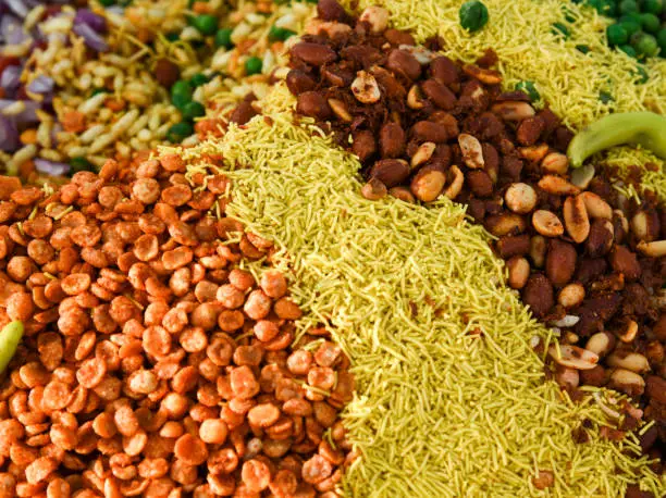 Fresh mix nuts and yellow fresh rice from a food market in India