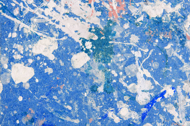 istock spots and splashes of pink and white paint on a blue background. abstract pattern for decoration 1219850712