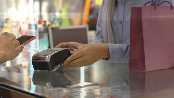 istock Asian Muslim Man Using Contactless Payment 1219850942