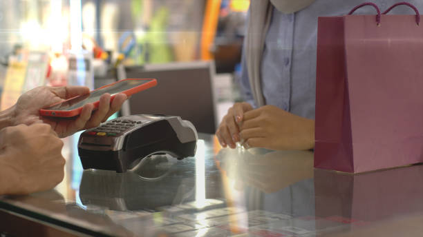 istock Asian Muslim Man Using Contactless Payment 1219850972
