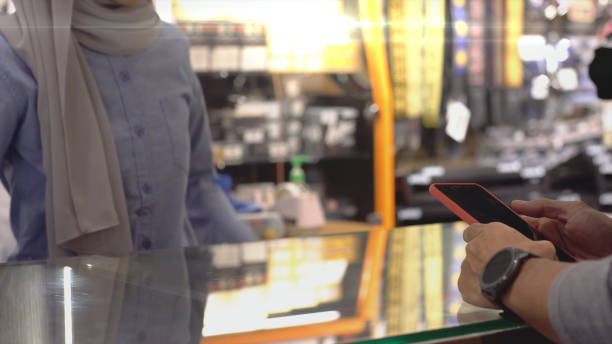 istock Asian Muslim Man Using Contactless Payment 1219851041