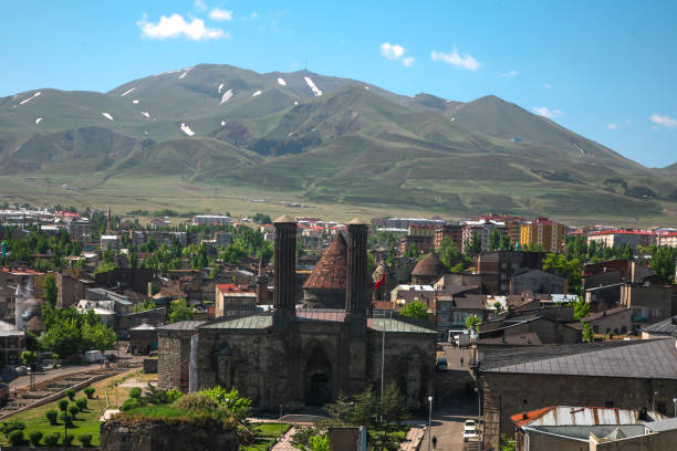 Üç Kümbetler (three kumbets) Erzurum, Turkey 28 August 2019 : Üç Kumbetler is one of the most beautiful examples of monumental tombs in Anatolia. It is believed that the largest of the three cupolas belongs to Emir Saltuk and was built at the end of the 12th century. While it is not known to whom the other cupolas belong, it is estimated that they were built in the 14th century. There are different opinions about what the small square-shaped building next to the cupolas is. It is stated that this is a cupola or mosque. Three cupolas were repaired by the Ministry of Education in 1956.