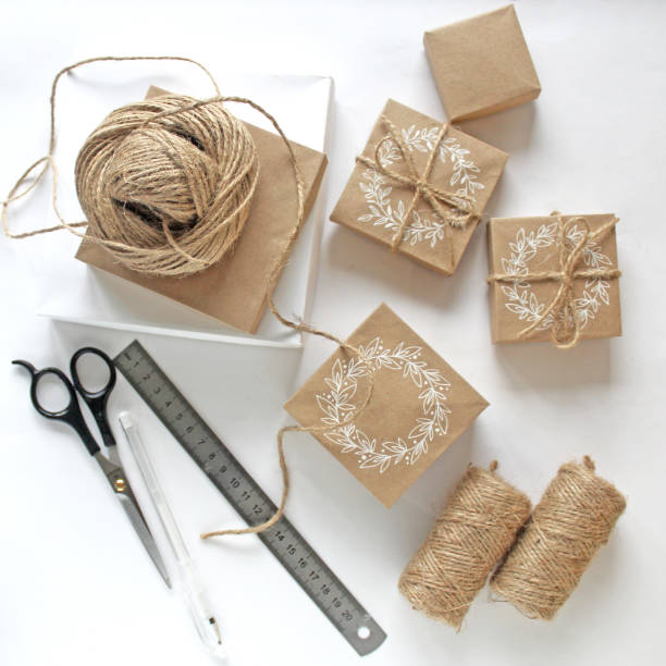 istock Set of accessories and tools, gift brown box for surprise craft hand made scissors ruler 1219862116