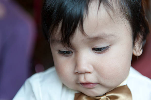 Cute bolivian baby dressed for a ceremony