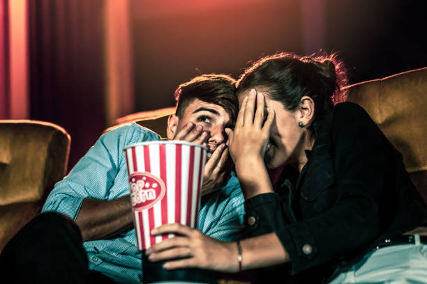 a couple lover watching movie in cinema theater. - audience surprise movie theater shock imagens e fotografias de stock