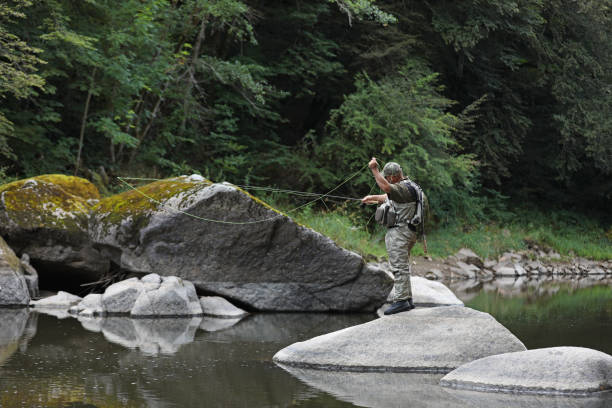 istock Funny fly fishing scene 1219866952