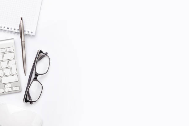 istock Workplace with computer, supplies and glasses 1219867534