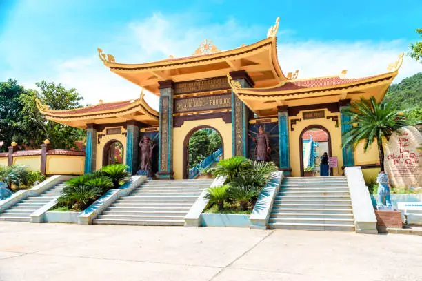 sunny day, a large beautiful temple in Vietnam, Phu Quoc island. many statues and beautiful temples.