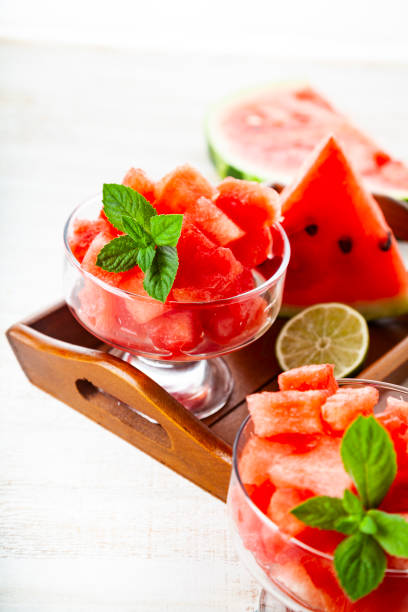 istock Pieces of watermelon with ice and mint 1219868551