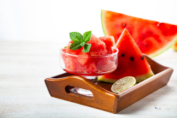 istock Pieces of watermelon with ice and mint 1219868577