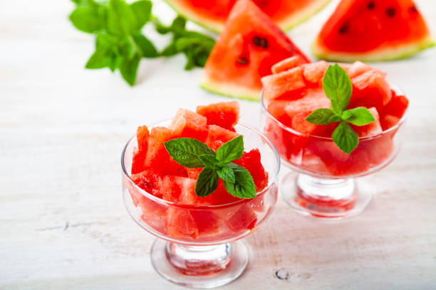 istock Pieces of watermelon with ice and mint 1219868606