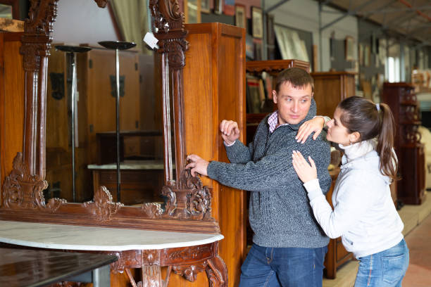 istock Married couple chooses new mirror in the store 1219869545