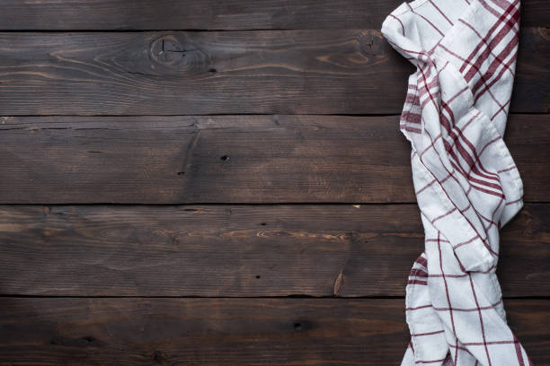 istock Textile napkin kitchen towel. Wooden rustic table background. Copy space. 1219871168
