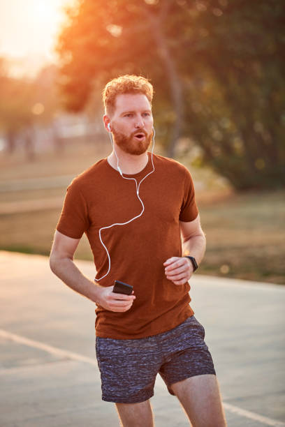 istock Modern young man working out in an urban park. 1219871410