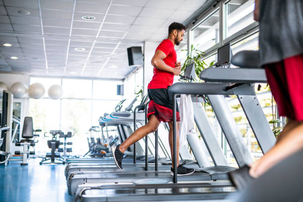 istock African Mid Adult Man Working Out on Treadmill 1219871482