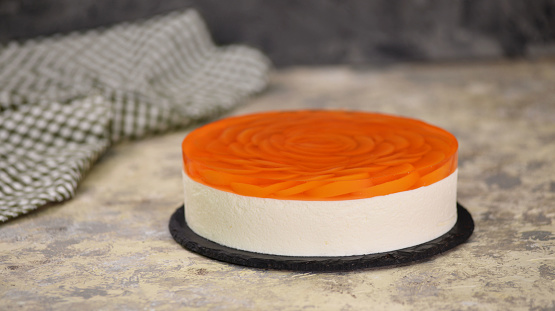 Homemade peach mousse cake with jelly