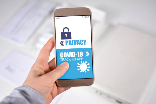 Corona Virus Tracking App privacy concerns concept with hand holding cell phone with application design showing choice between app and privacy Corona Virus Tracking App privacy concerns concept with female hand holding cell phone with application design showing choice between app and privacy on blurry office background tracing stock pictures, royalty-free photos & images