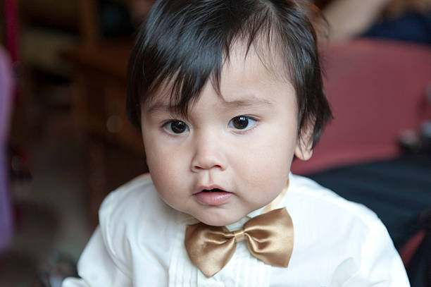 Cute bolivian baby dressed for a ceremony