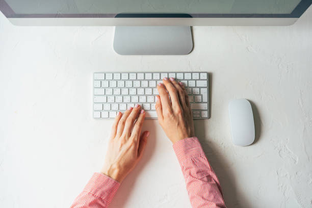istock Layout of a minimalistic workplace with a computer and keyboard. 1219882730