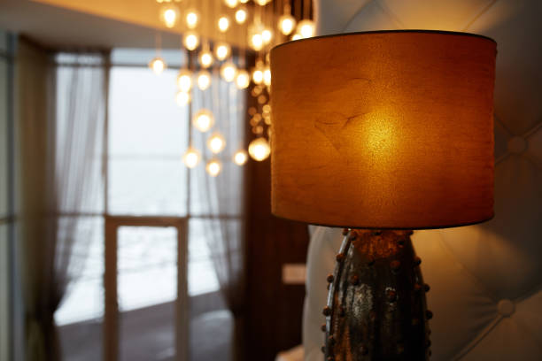istock lamp in a cozy warm interior 1219884693