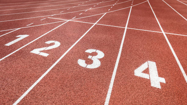 istock Close-up clean and refreshing red simple rubber runway without people 1219884993
