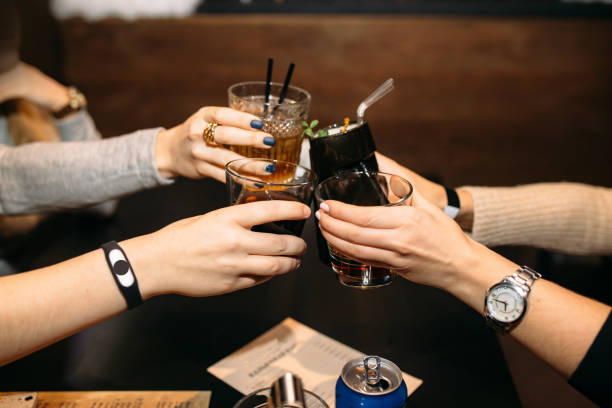 istock friends clink glasses 1219885130