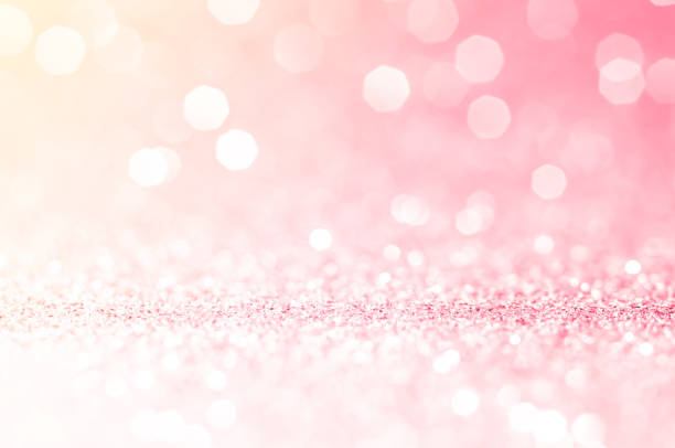 istock Pink gold, pink bokeh,circle abstract light background,Pink Gold shining lights,sparkling glittering Valentines day,women day or event lights romantic backdrop.Blurred abstract holiday background. 1219886484